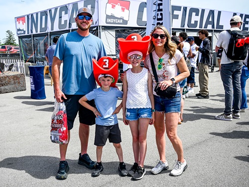 A family enjoys the fan zone