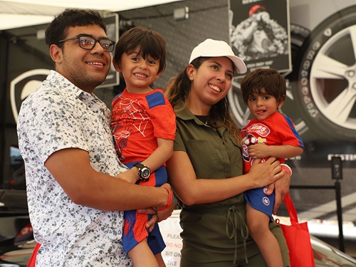 A family enjoys the fan zone
