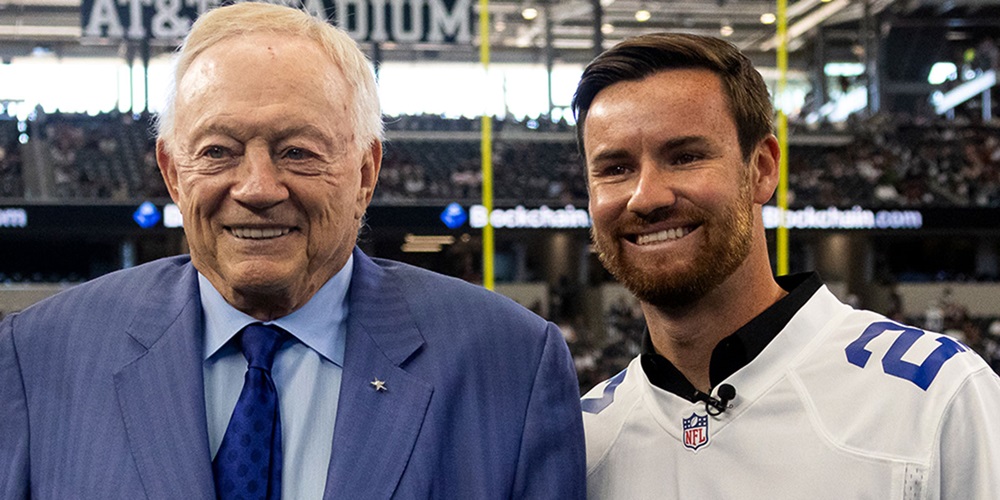 Jerry Jones and Kyle Kirkwood pose at a Dallas Cowboys game