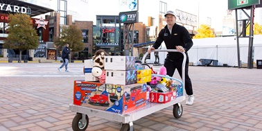 INDYCAR’s Christian Rasmussen Joins Texas Rangers for Holiday Toy Drive