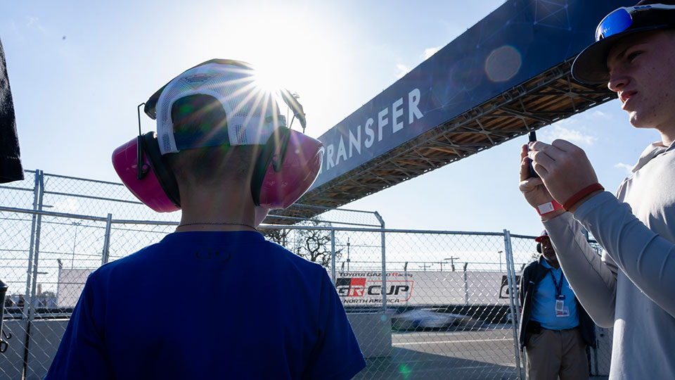 A child watches on track activity