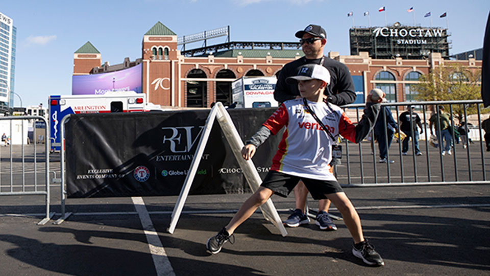 A child throws a baseball