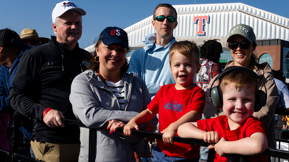 Fans pose in front of Globe Life Field