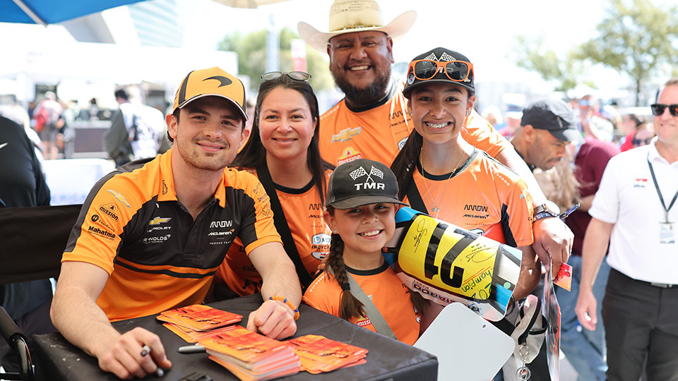 Fans pose with Pato O'Ward